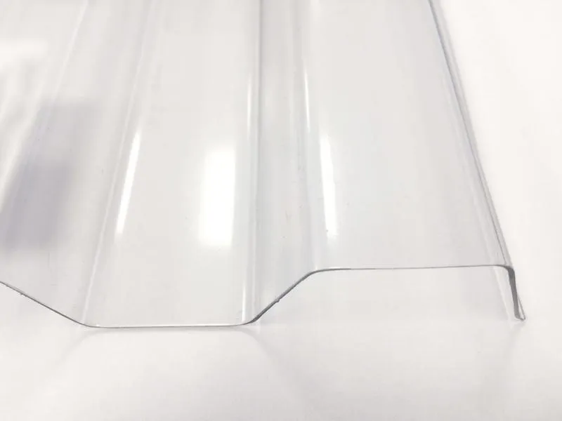 PET-Lichtplatte 70/18 Trapez 1,1 mm glatt - klar - von vorne fotografiert PET-Lichtplatte 70/18 Trapez 1,1 mm glatt - klar - von vorne fotografiert